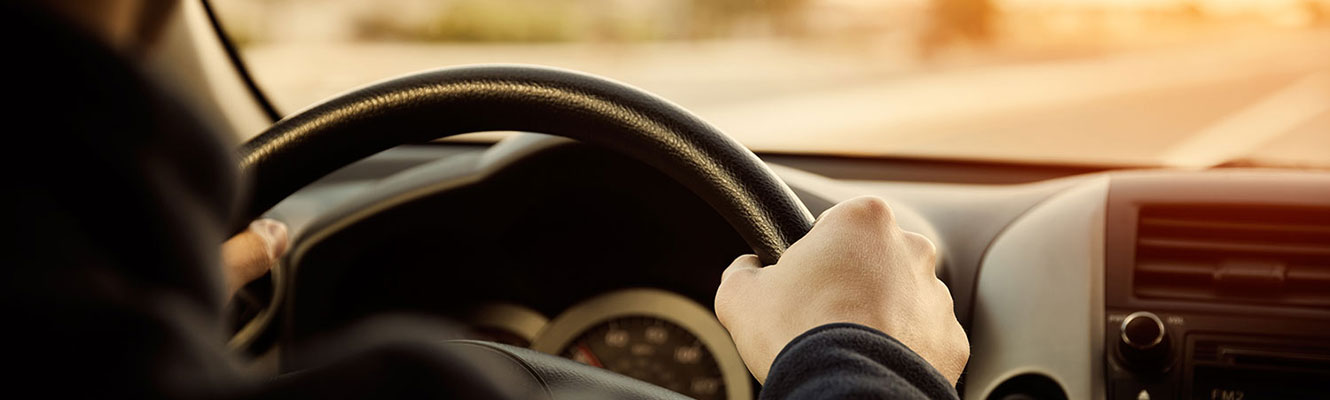 Man driving car.