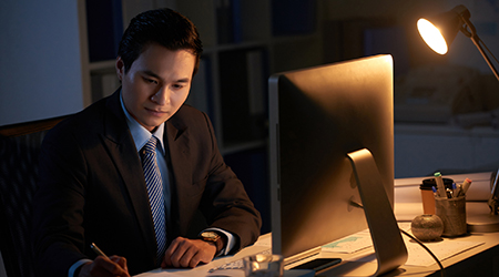 Businessman working late.